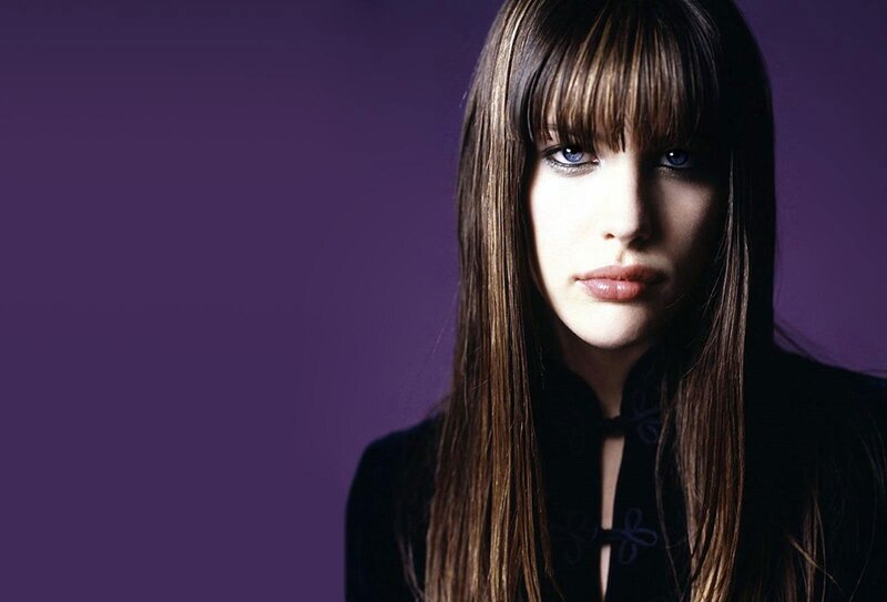 woman with blue eyes and bangs