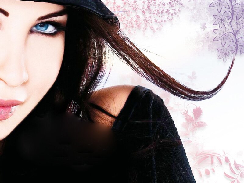 woman with blue eyes and black hat