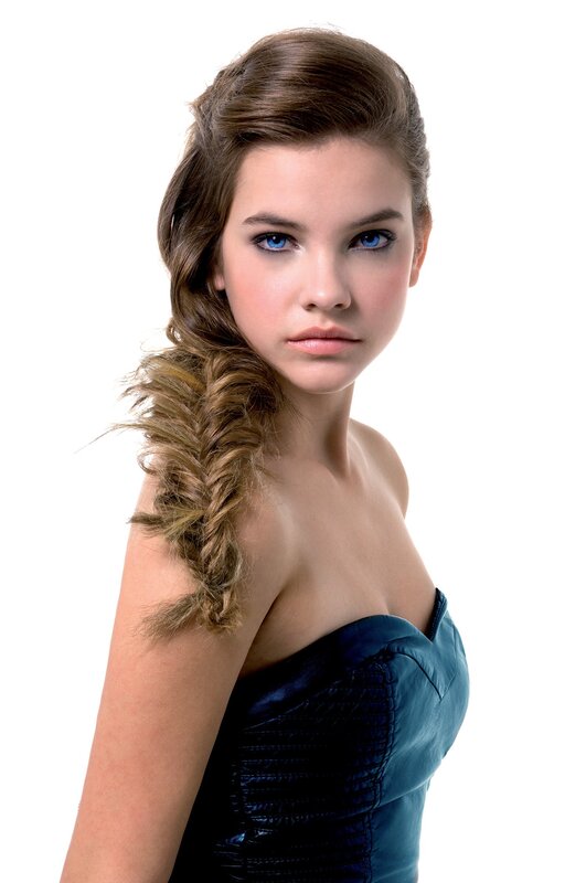 woman with blue eyes and braid