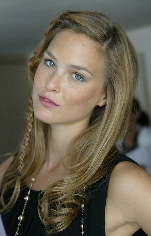 woman with blue eyes and braided hair