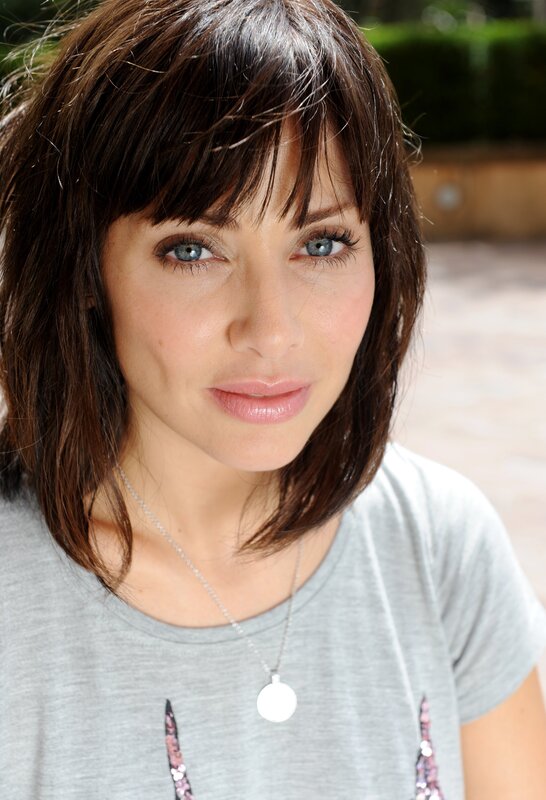 woman with blue eyes and brown hair
