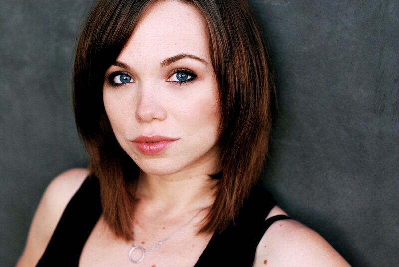 woman with blue eyes and brown hair