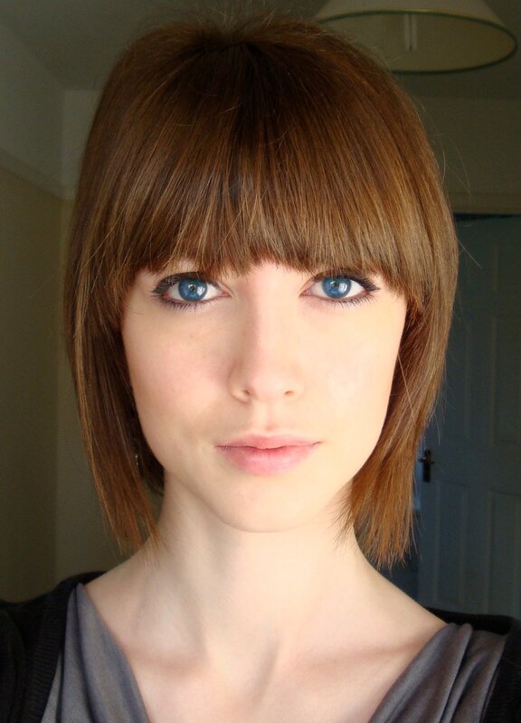 woman with blue eyes and brown hair