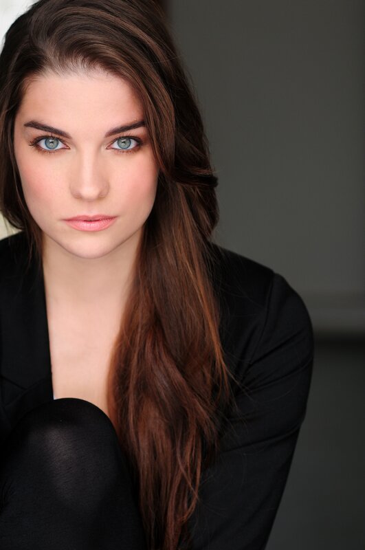 woman with blue eyes and brown hair