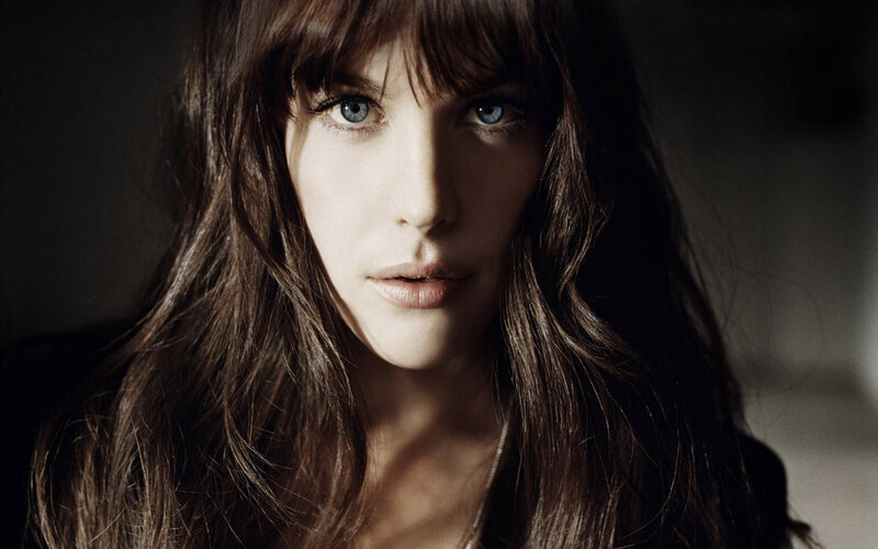 woman with blue eyes and brown hair