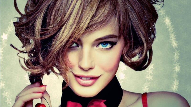 woman with blue eyes and cherry