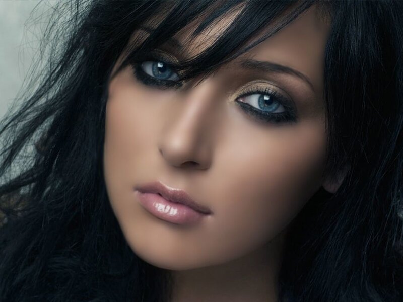 woman with blue eyes and dark hair