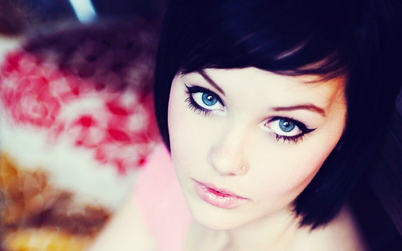 woman with blue eyes and dark hair