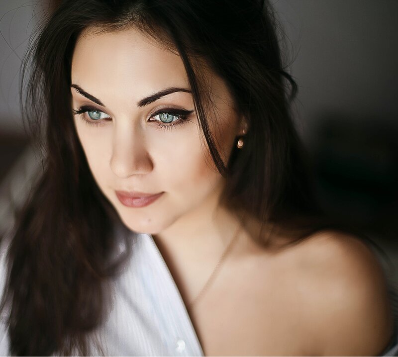 woman with blue eyes and dark hair