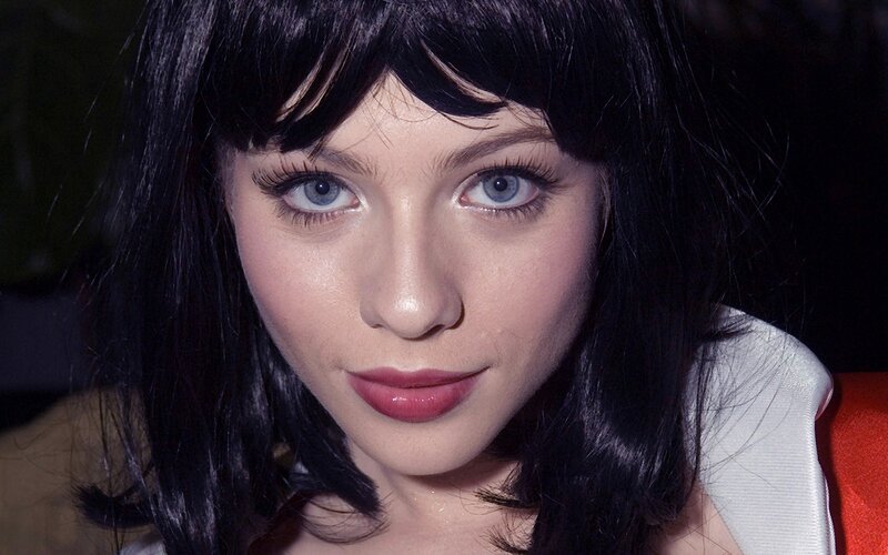 woman with blue eyes and dark hair