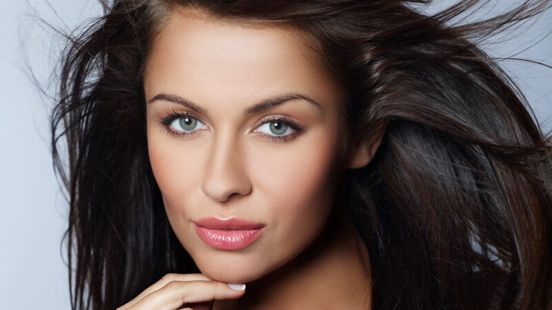 woman with blue eyes and dark hair
