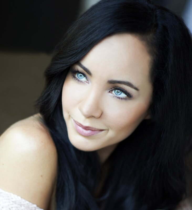 woman with blue eyes and dark hair