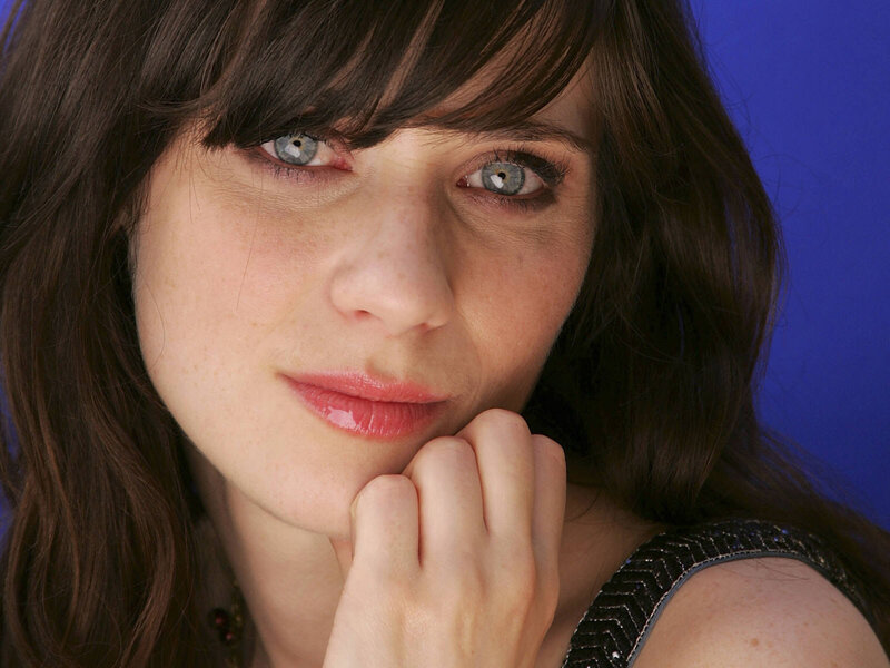 woman with blue eyes and dark hair