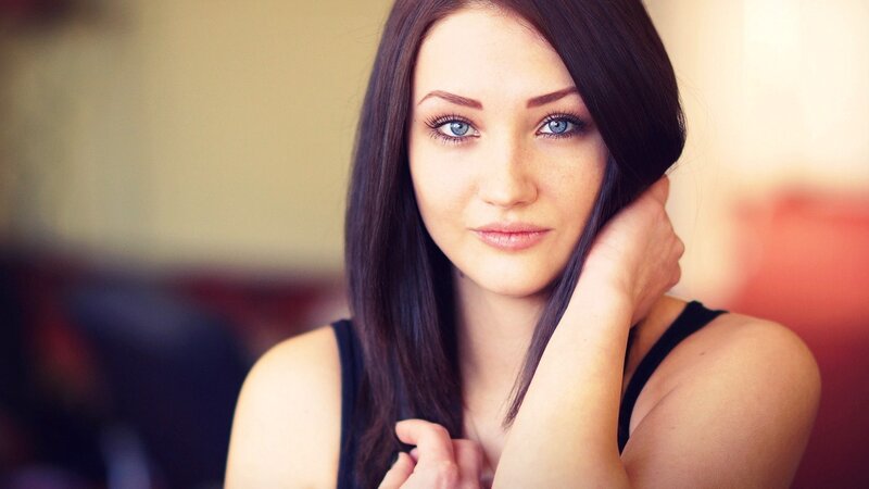 woman with blue eyes and dark hair