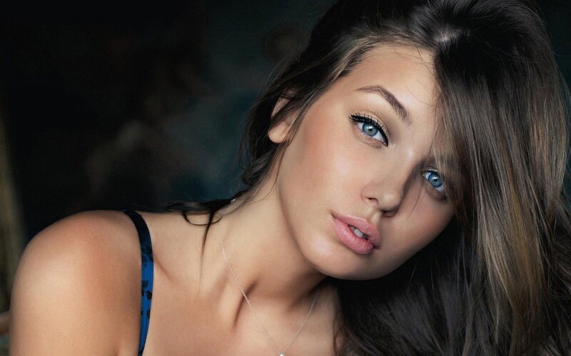 woman with blue eyes and dark hair