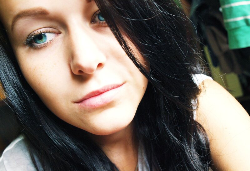 woman with blue eyes and dark hair