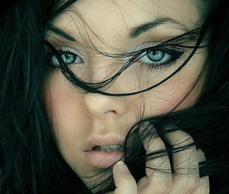 woman with blue eyes and dark hair