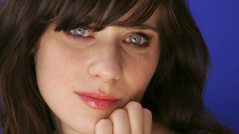 woman with blue eyes and dark hair