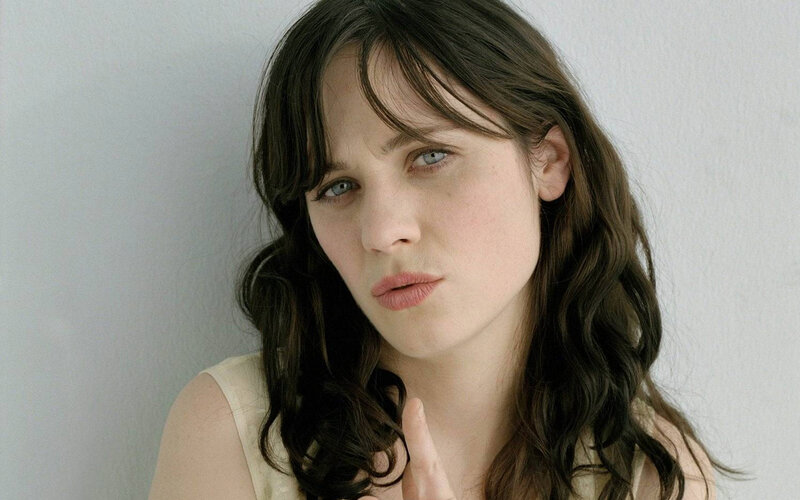 woman with blue eyes and dark hair