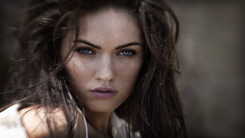 woman with blue eyes and dark hair