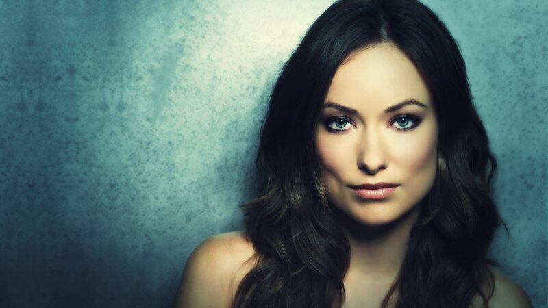 woman with blue eyes and dark hair