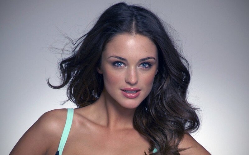 woman with blue eyes and dark hair