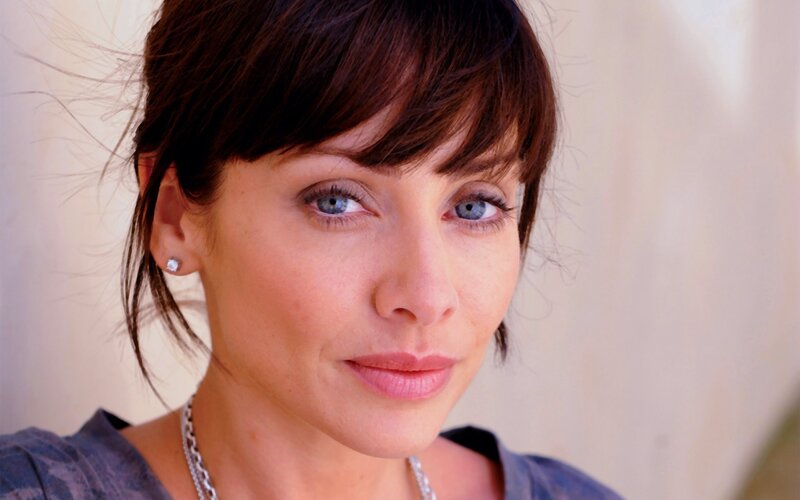 woman with blue eyes and dark hair