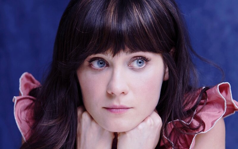 woman with blue eyes and dark hair