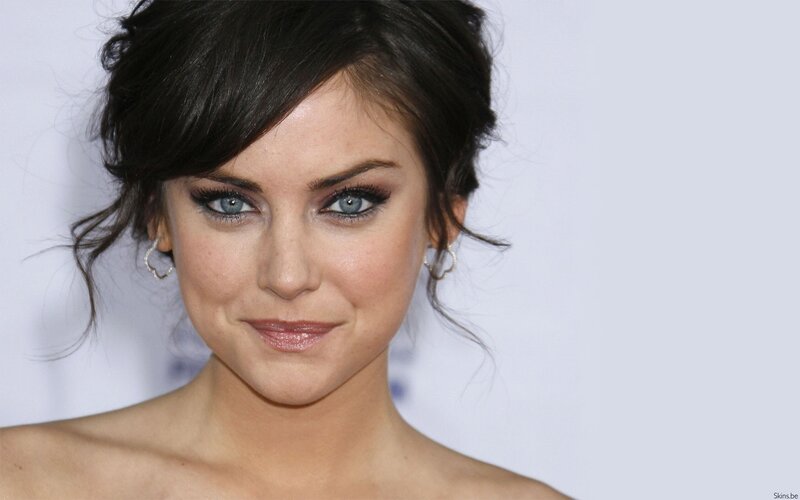 woman with blue eyes and dark hair