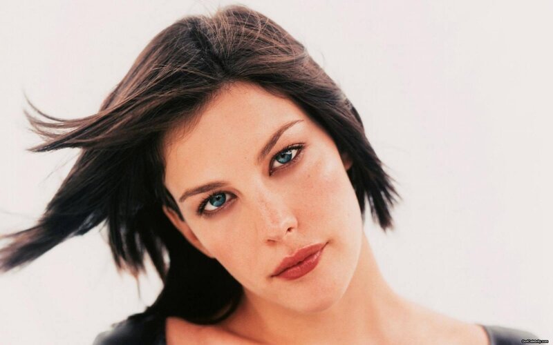 woman with blue eyes and dark hair