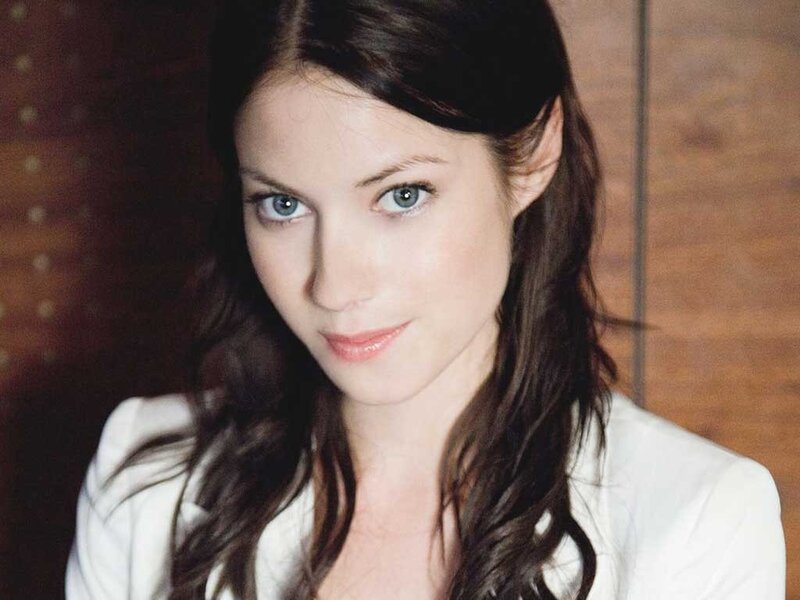 woman with blue eyes and dark hair