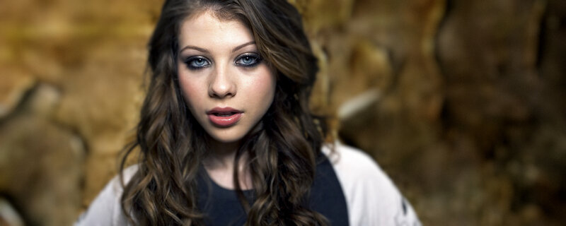woman with blue eyes and dark hair