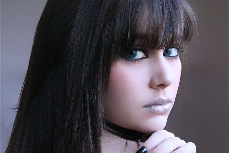 woman with blue eyes and dark hair