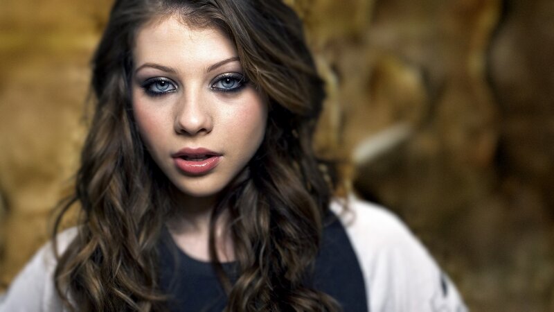 woman with blue eyes and dark hair