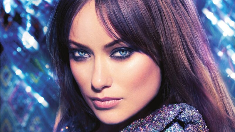woman with blue eyes and dark hair