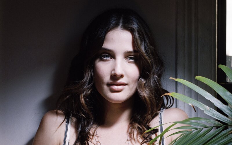 woman with blue eyes and dark hair