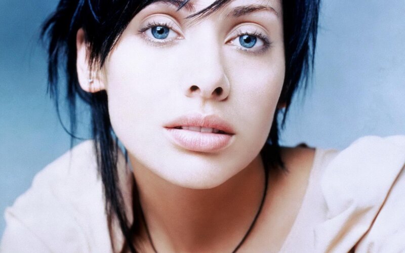 woman with blue eyes and dark hair