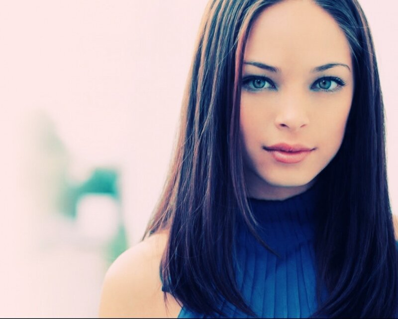 woman with blue eyes and dark hair