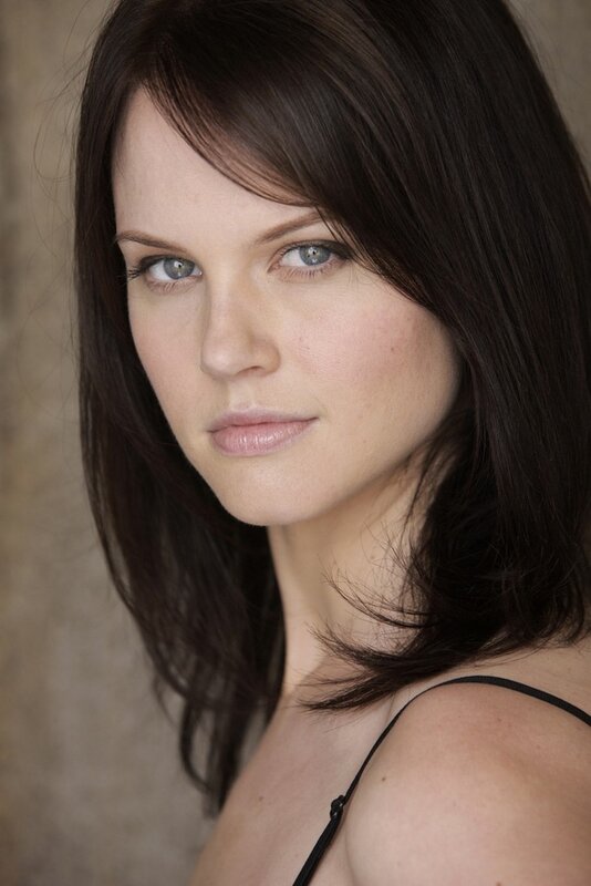woman with blue eyes and dark hair