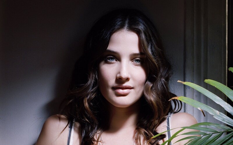 woman with blue eyes and dark hair