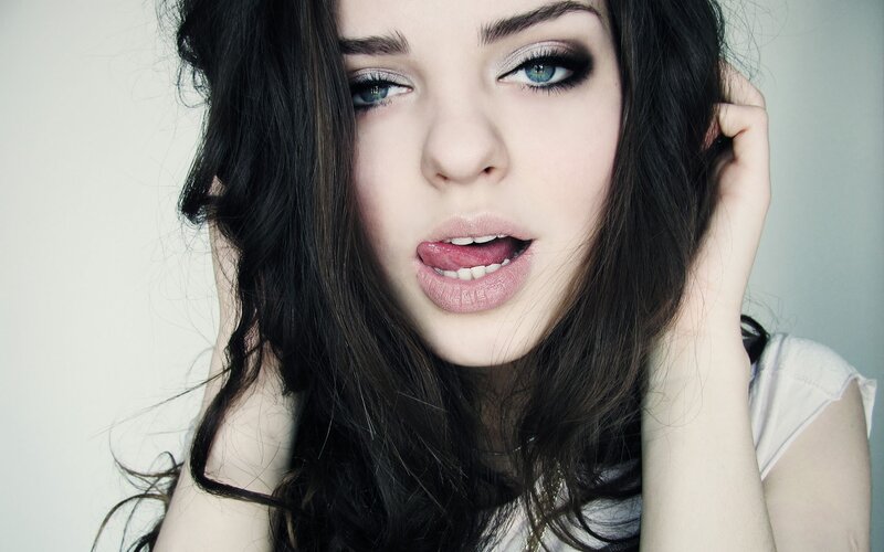 woman with blue eyes and dark hair