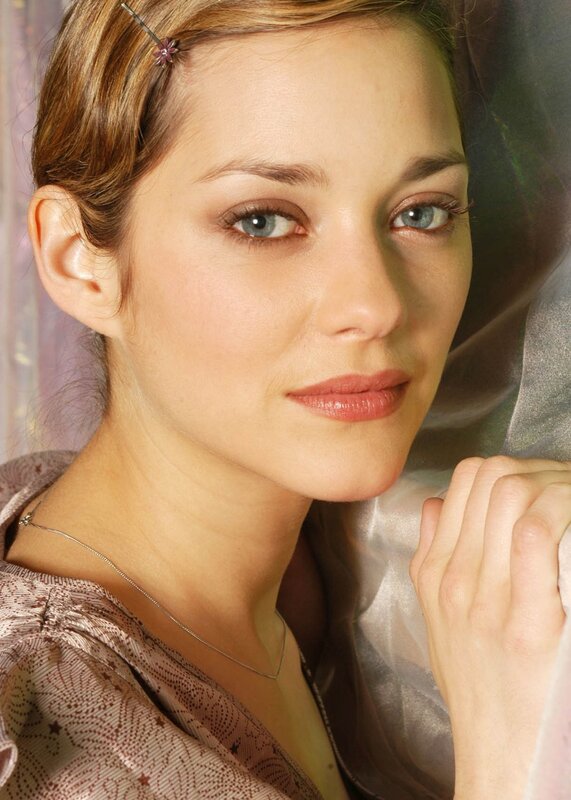 woman with blue eyes and hair clip