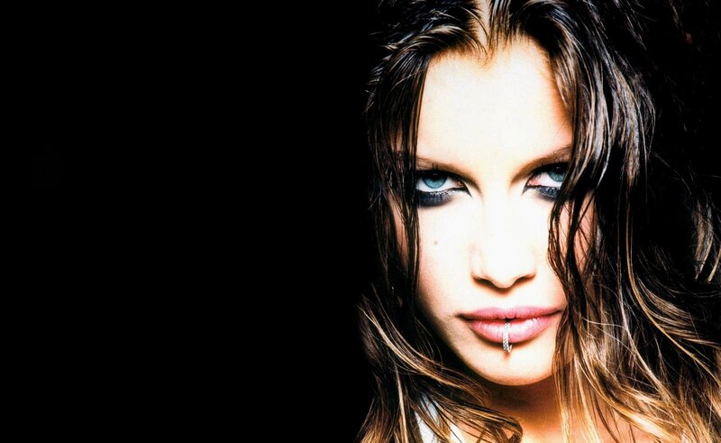 woman with blue eyes and lip ring
