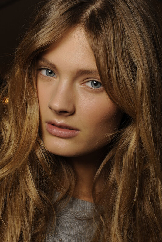 woman with blue eyes and long hair