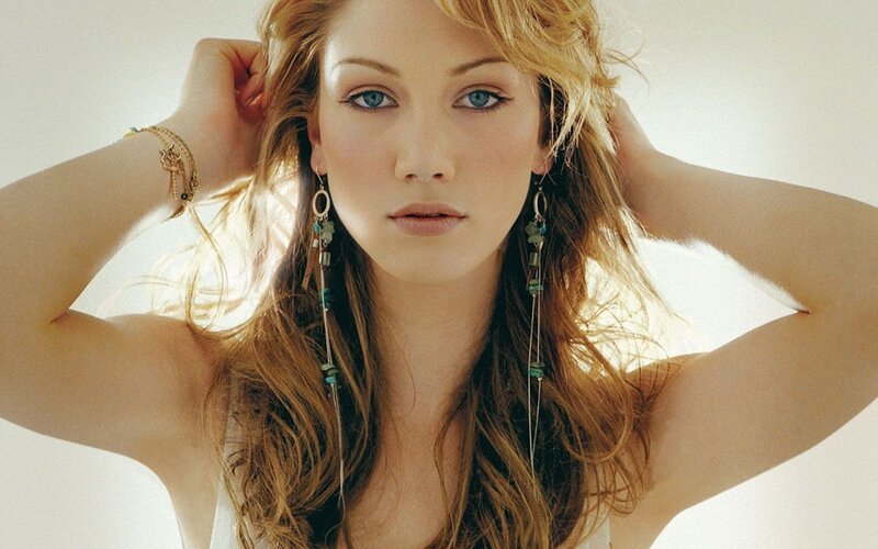 woman with blue eyes and long hair