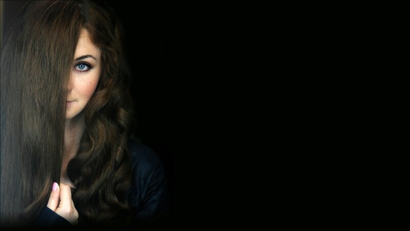 woman with blue eyes and long hair