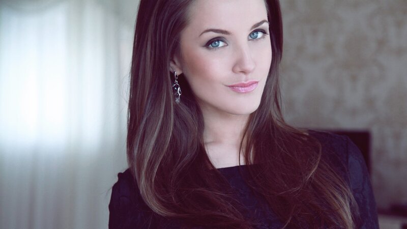 woman with blue eyes and long hair