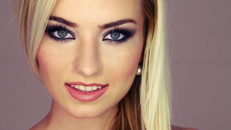 woman with blue eyes and makeup