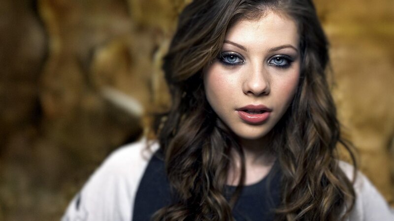 woman with blue eyes and makeup