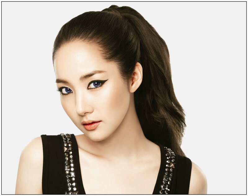 woman with blue eyes and makeup